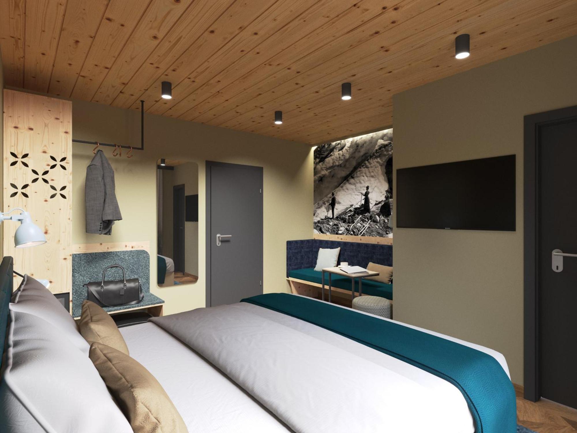 Budget Doppelzimmer mit Balkon und Blick auf das Dorf